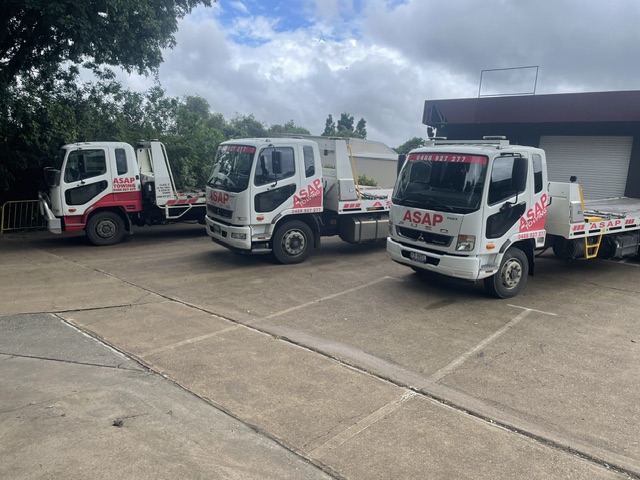 ASAP Towing fleet of tilt tray trucks